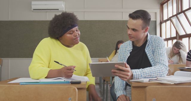 Students Collaborating on Tablet During Classroom Study Session - Download Free Stock Images Pikwizard.com