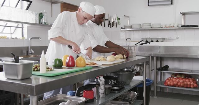 Chefs Preparing Fresh Vegetables in Modern Commercial Kitchen - Download Free Stock Images Pikwizard.com