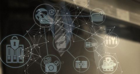 Businessman with digital network interface icons