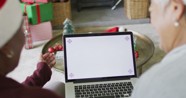 Seniors Enjoying Holiday Video Call on Laptop - Download Free Stock Images Pikwizard.com