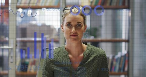 Businesswoman Engaged in Modern Data Analysis with Graphs