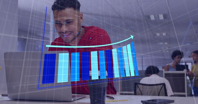 Smiling Business Professional Working on Laptop with Bar Graph Overlay - Download Free Stock Images Pikwizard.com