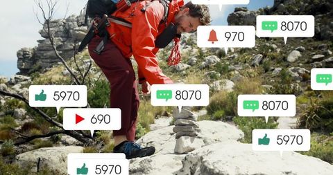 Adventurous Hiker Engages with Digital Notifications on Trail