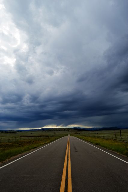 Empty Road Leading to Dramatic Stormy Sky - Download Free Stock Photos Pikwizard.com