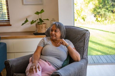 Senior Woman Relaxing in Comfortable Home Setting