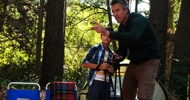 Father and Son Enjoying Camping in Forest Outdoors - Download Free Stock Images Pikwizard.com