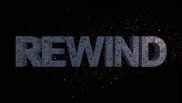 Glowing rewind binary typography floating in outer space with digital particle halo