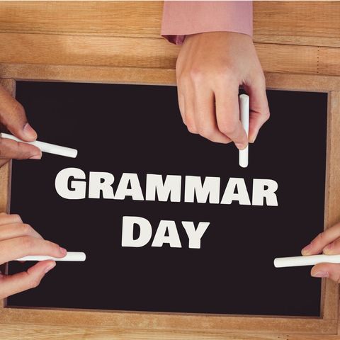 hands framing chalkboard with grammar day message - Download Free Stock Templates Pikwizard.com