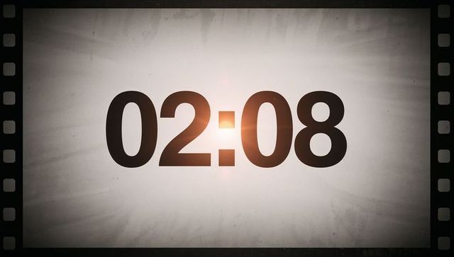 Vintage countdown timer with lens flare and filmstrip border