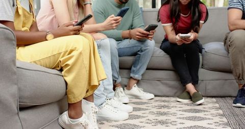 Multicultural Group Socializing with Smartphones in Living Room