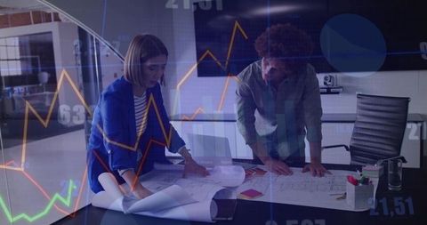 Business Professionals Analyzing Blueprints in Technologically Advanced Office