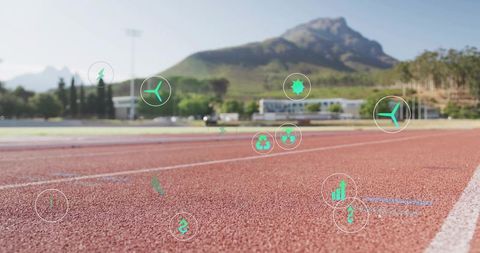 Eco tech athletics track displaying floating sustainability icons with mountain backdrop