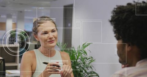 Office worker explaining idea in modern workspace