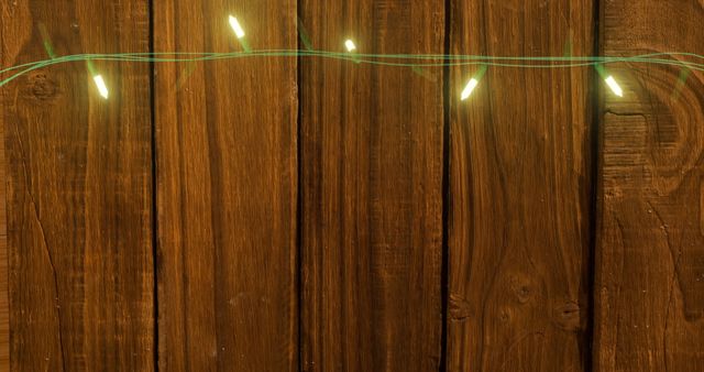 Flickering Fairy Lights Against Rustic Wooden Background with Copy Space - Download Free Stock Images Pikwizard.com