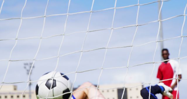 Soccer Player Scoring Goal Mid Action on Field - Download Free Stock Images Pikwizard.com