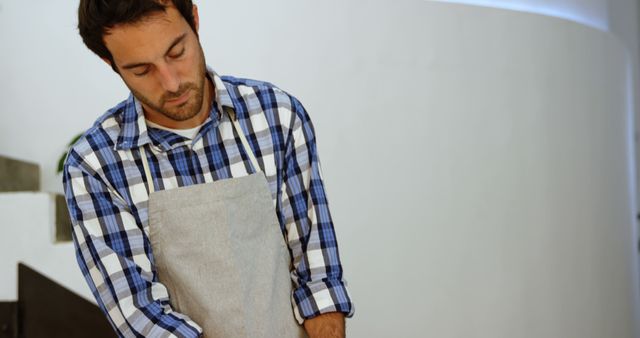 Barista Preparing Coffee Wearing Plaid Shirt - Download Free Stock Images Pikwizard.com