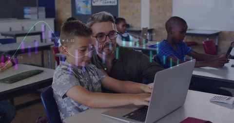 Teacher guiding student on laptop with data visualization overlay in classroom