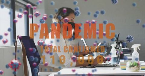 Focused Masked Woman Typing in Modern Office Amidst Pandemic Context