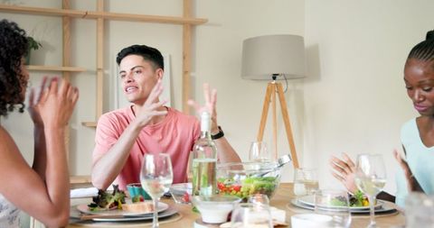 Diverse Friends Sharing a Fun Dinner Celebration