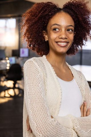 Confident Young Professional Woman in Modern Office Workspace