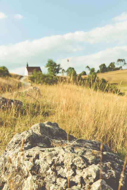 Idyllic Rural Landscape with Church and Golden Field at Sunset - Download Free Stock Images Pikwizard.com