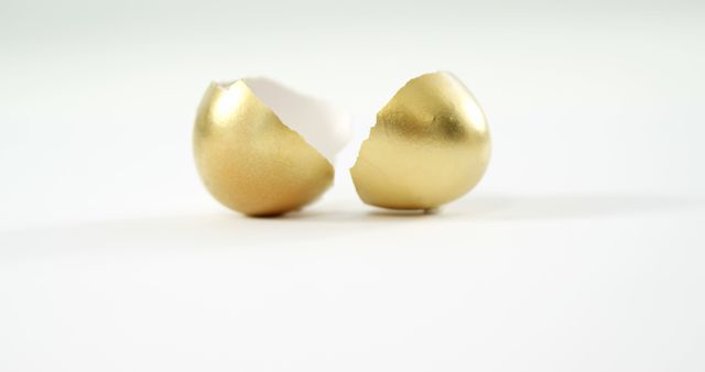 Golden Egg Shells Cracked on White Symbolizing Opportunity - Download Free Stock Images Pikwizard.com