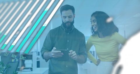 Colleagues Discussing Financial Data Analysis in Modern Office