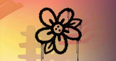 Displaying black dripping graffiti flower on vibrant urban wall with hash symbol