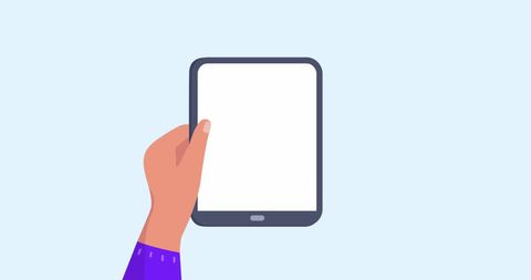 Hand holding tablet with blank screen on light blue background