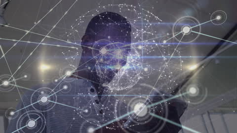 Digital Network Overlay on Businessman Holding Tablet