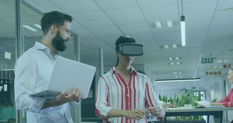 Team Collaboration in Modern Office with VR Headset