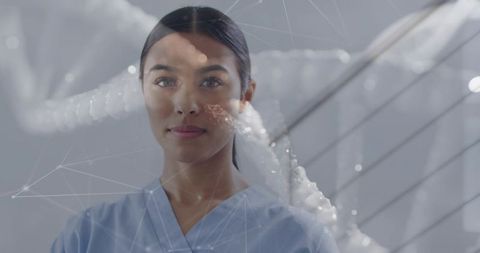 Healthcare professional in scrubs studying genomics with dna network overlay