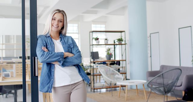 Confident Businesswoman Standing in Modern Office Space - Download Free Stock Images Pikwizard.com