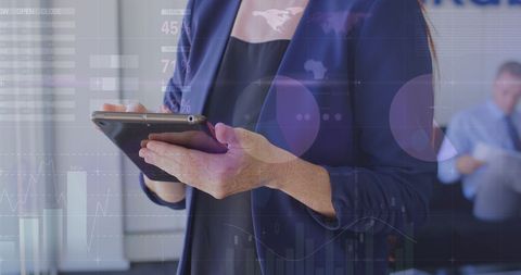 Businesswoman Analyzing Financial Charts on Tablet - Download Free Stock Images Pikwizard.com