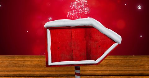 Blank Red Wooden Arrow Sign with Festive Background