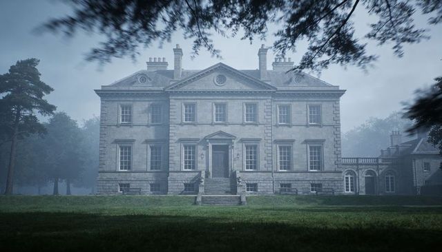 Georgian manor standing in morning mist on country lawn, symmetrical stone estate featuring entrance