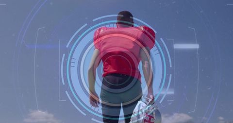 Futuristic Technology Interface with Football Player Outdoors