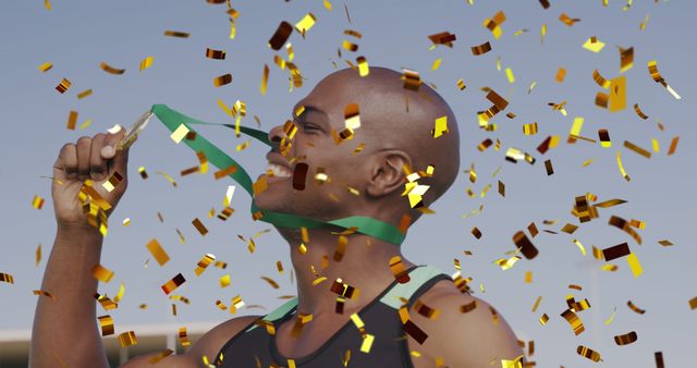 Image of gold confetti falling over african american man holding gold medal. Sports, competition and celebration concept digitally generated image.