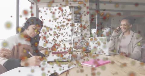 Mother and Daughter Collaborating in Home Office with Technology Effect