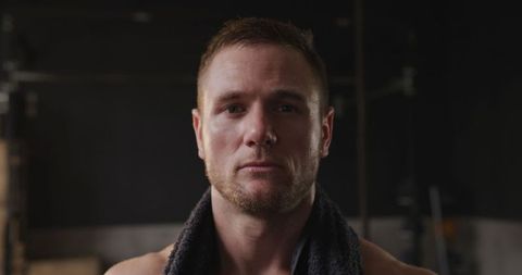 Fit Athletic Man Taking Break in Gym Appearance