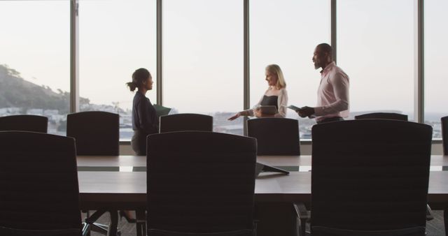 Business Professionals Meeting in Modern Conference Room with Large Windows - Download Free Stock Images Pikwizard.com