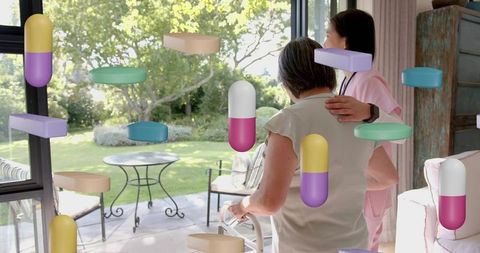 Caregiver guiding senior with walker through sliding doors to patio with capsules