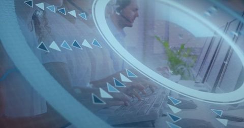 Business Professionals Typing in Open-Plan Office with Digital Interface Overlay