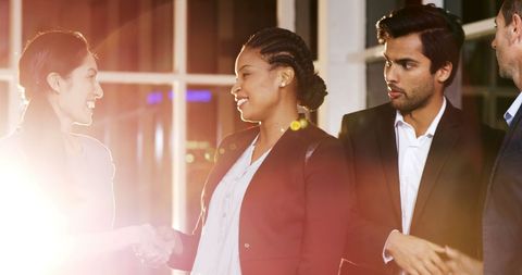 Diverse Businesswomen Shaking Hands in Office