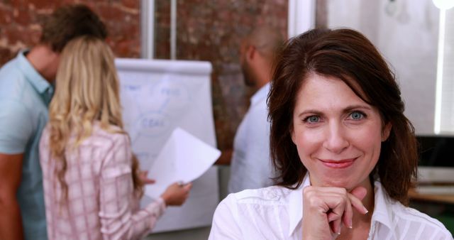 Confident Businesswoman Leading Team Meeting - Download Free Stock Images Pikwizard.com