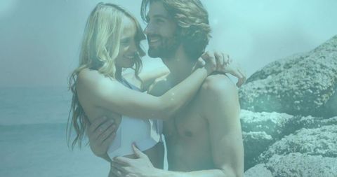 Romantic Couple Enjoying Beach Getaway on Rocky Shoreline