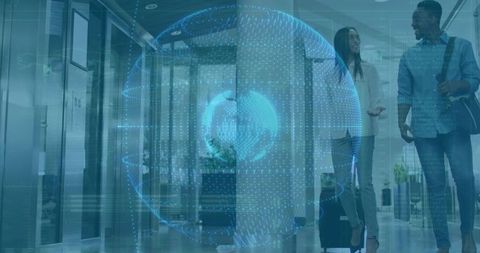 Business professionals discussing innovative technology in office