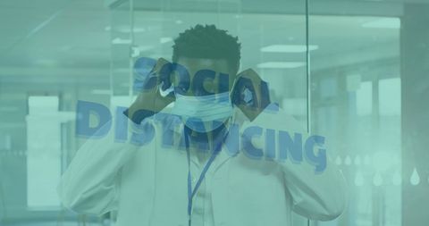 Scientist Adjusting Face Mask with Emphasis on Social Distancing