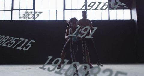 Dynamic battle rope exercise for energy and strength at gym