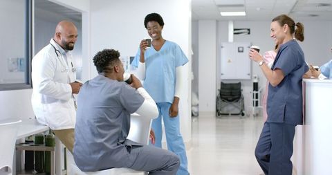 Diverse Medical Team Relaxing in Hospital Break Room - Download Free Stock Images Pikwizard.com
